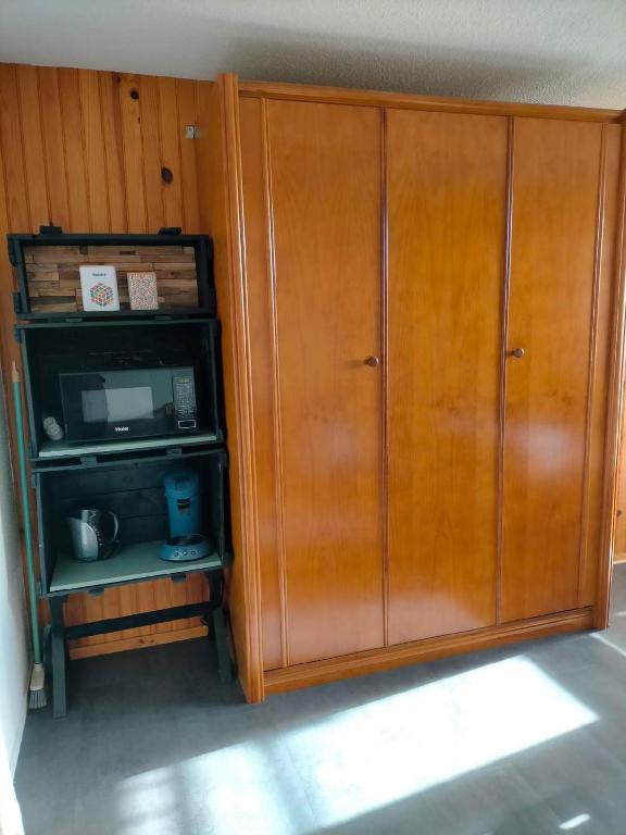 Kuchyňa alebo kuchynka v ubytovaní Appartement situé en plein centre à deux pas des pistes.