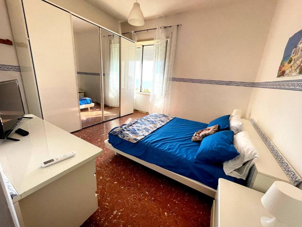 Postel nebo postele na pokoji v ubytování Scauri Holiday