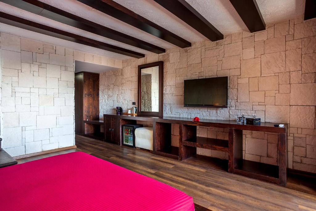 Kuchyň nebo kuchyňský kout v ubytování Manaspark Deluxe Hotel