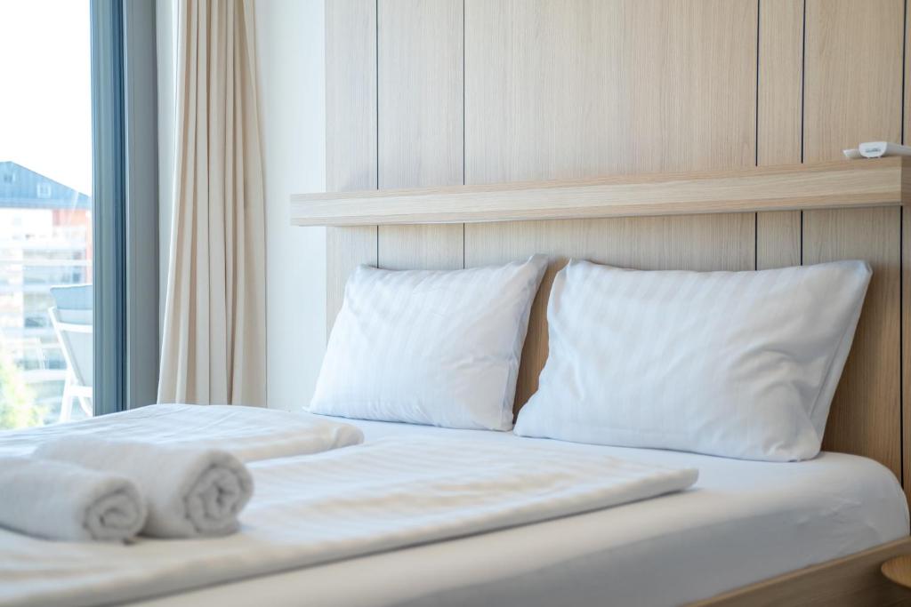 Posteľ alebo postele v izbe v ubytovaní MyFlat Casa Coral Apartment
