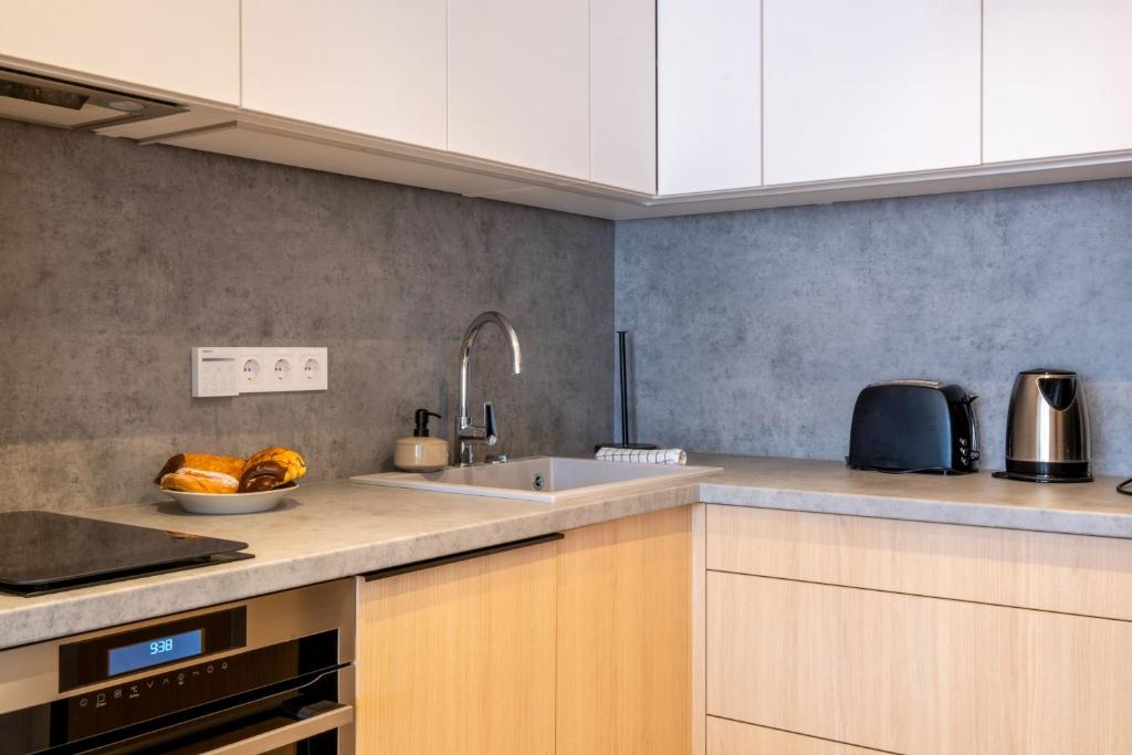 Kuchyňa alebo kuchynka v ubytovaní MyFlat Casa Coral Apartment