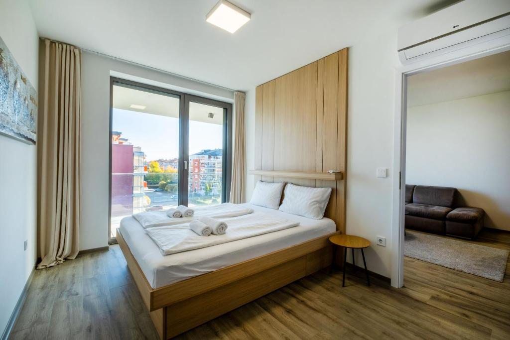 Posteľ alebo postele v izbe v ubytovaní MyFlat Casa Coral Apartment