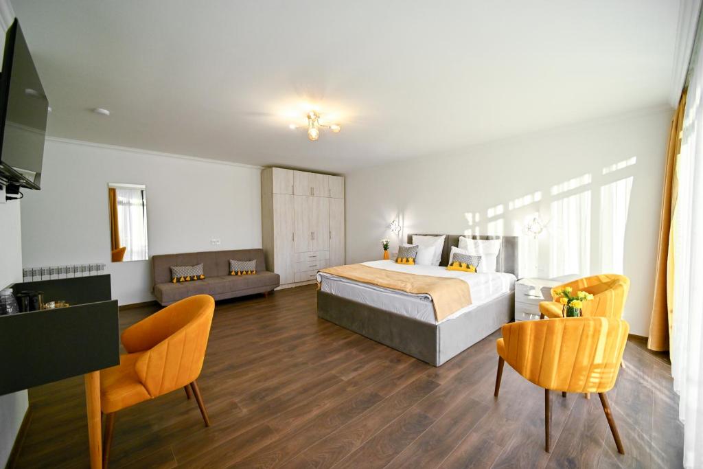 Postel nebo postele na pokoji v ubytování Aurelia Hotel & Restaurant