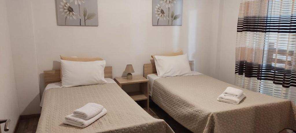 Postel nebo postele na pokoji v ubytování Meteora Mandras House