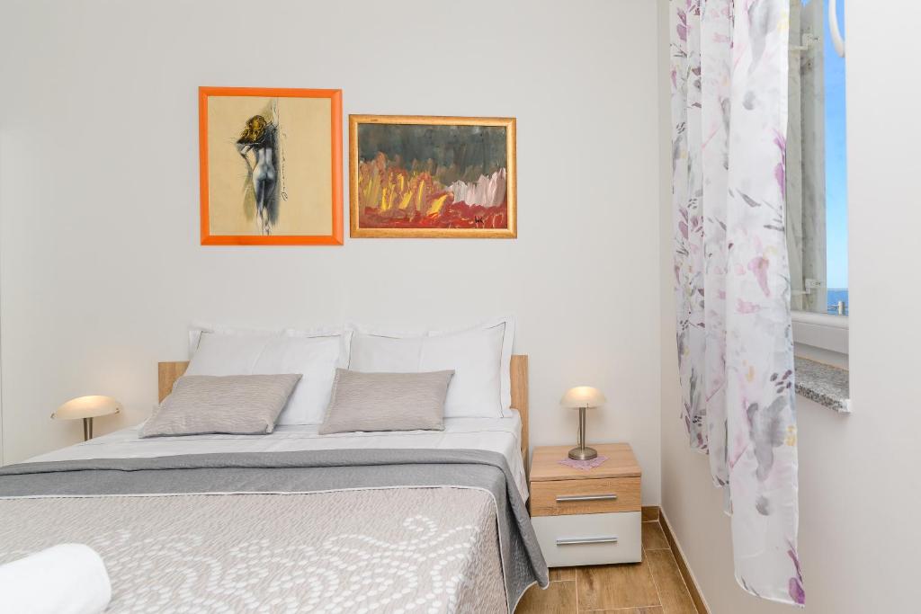 Voodi või voodid majutusasutuse Rooms FOREVER toas
