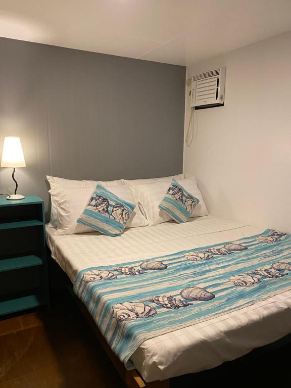 Postel nebo postele na pokoji v ubytování Happy Camper Hostel