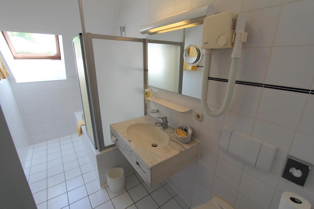 Koupelna v ubytování Abasto Hotel Eichenau