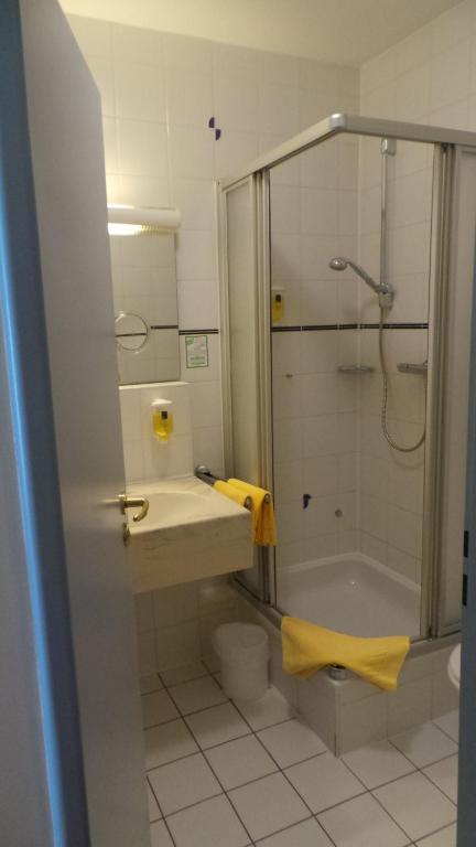Koupelna v ubytování Abasto Hotel Eichenau