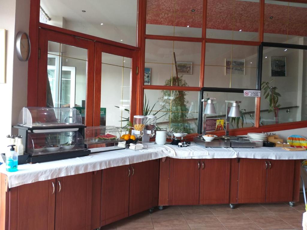 A kitchen or kitchenette at Agali Hotel