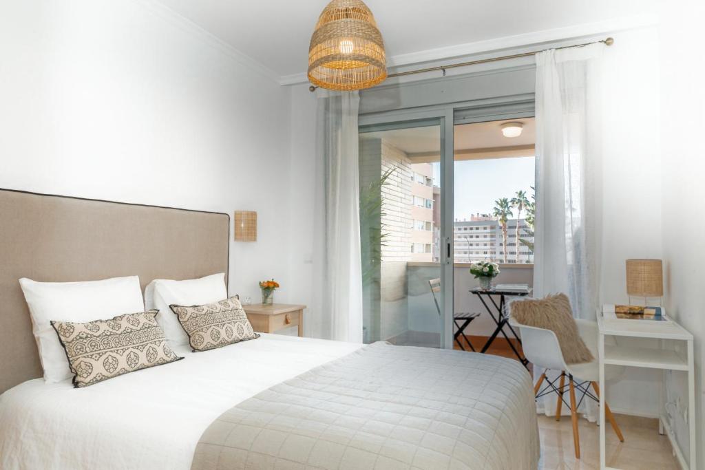 Posteľ alebo postele v izbe v ubytovaní PRECIOSO APARTAMENTO EN MARIA ZAMBRANO