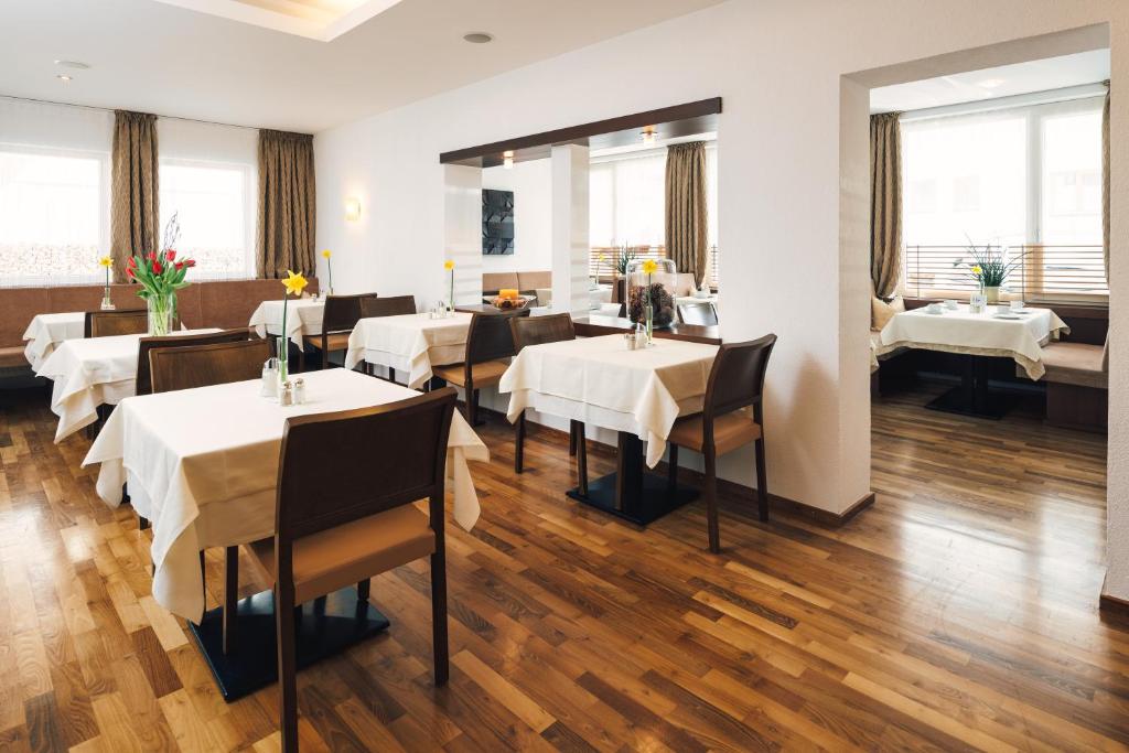 Postel nebo postele na pokoji v ubytování Hotel Regina