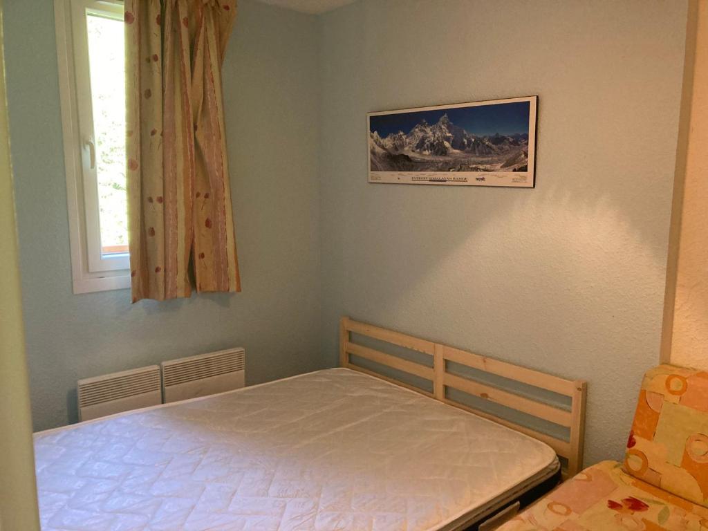 Posteľ alebo postele v izbe v ubytovaní Le Pleynet: 2P Cabine, 30m², 6 pers, à 300m des pistes, balcon, ascenseur - FR-1-557A-49