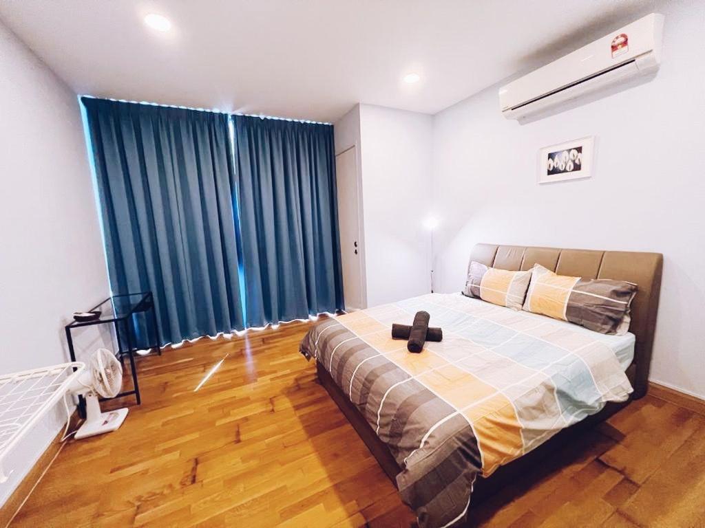 a bedroom with a bed and a large window at PROMO Connected train 1 Bedroom ABOVE MALL 3a in Kuala Lumpur