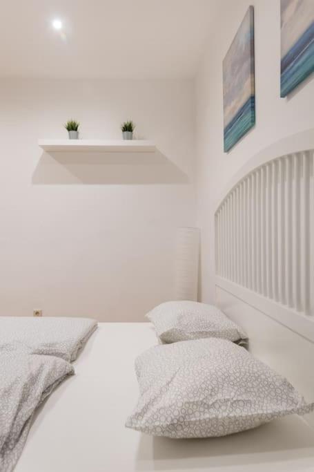 Posteľ alebo postele v izbe v ubytovaní Spacious central apartment