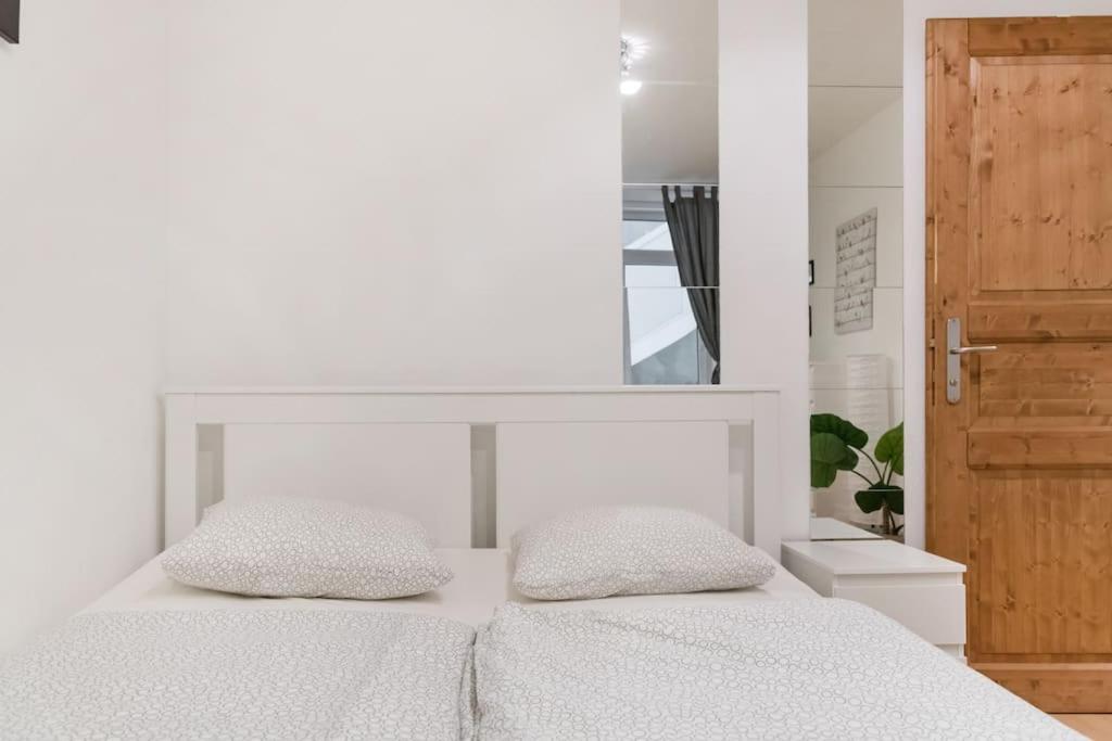 Posteľ alebo postele v izbe v ubytovaní Spacious central apartment