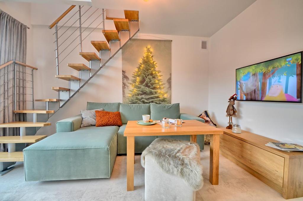 Posedenie v ubytovaní Apartament Pistacjowy