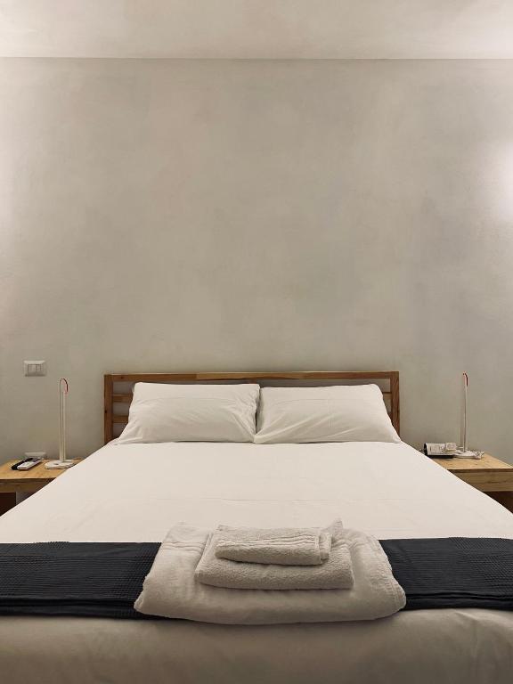 Postel nebo postele na pokoji v ubytování Olea b&b