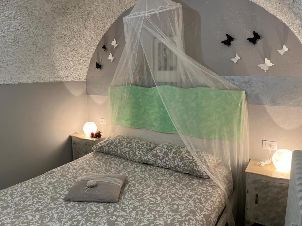 Postel nebo postele na pokoji v ubytování Casa Cristina - Vista Lago