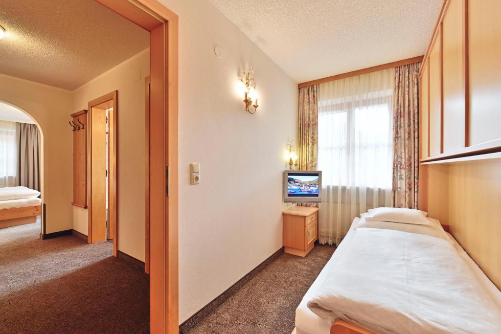 Postel nebo postele na pokoji v ubytování Hotel Bianca