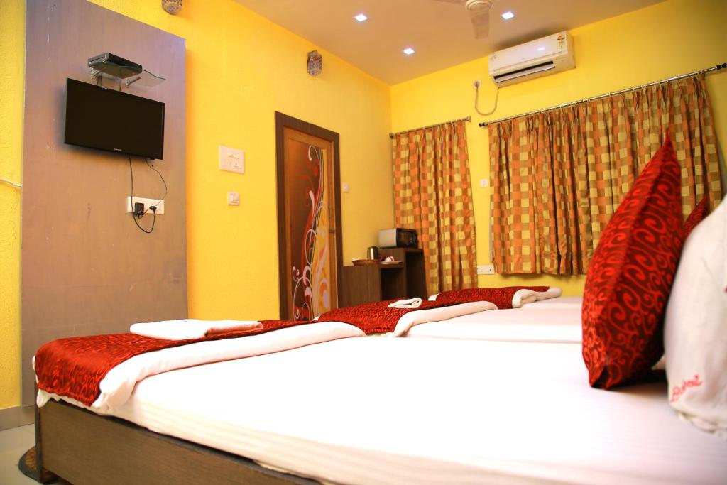 Postel nebo postele na pokoji v ubytování Babul Hotel