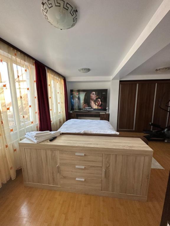 Postel nebo postele na pokoji v ubytování Brasov Place