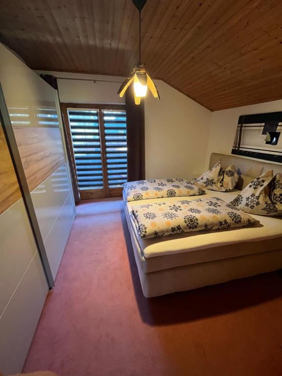 Postel nebo postele na pokoji v ubytování Haus Knauß