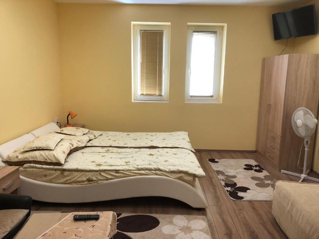 Postel nebo postele na pokoji v ubytování Relax Bogács