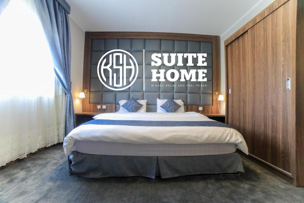 En eller flere senge i et værelse på للعائلات Suite Home at KAEC شقة بأثاث فندقي مدينة الملك عبدالله الإقتصادية