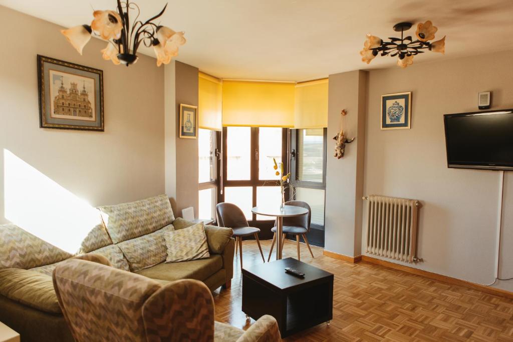 a living room with a couch and a table at Vut RAQUEL in Astorga