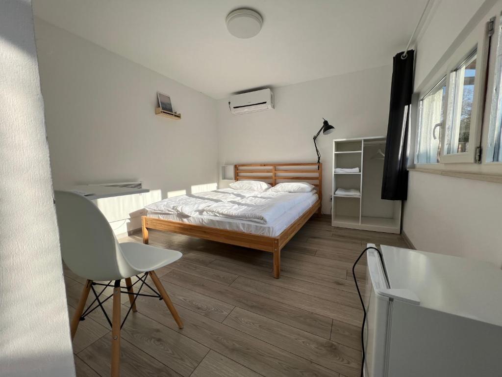 Postel nebo postele na pokoji v ubytování Pixel Guesthouse