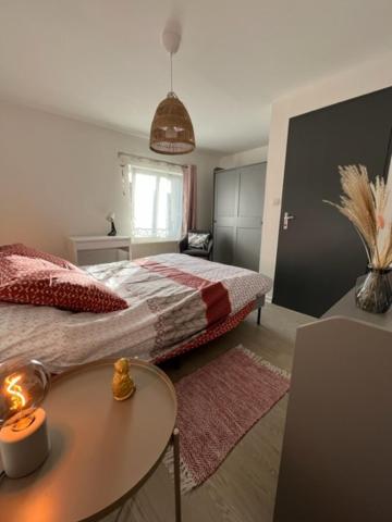 Posteľ alebo postele v izbe v ubytovaní L'Annexe by Steph