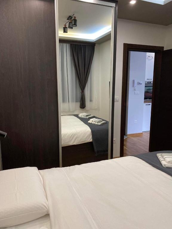 Postel nebo postele na pokoji v ubytování Apartman Sivcevic Titova VIla