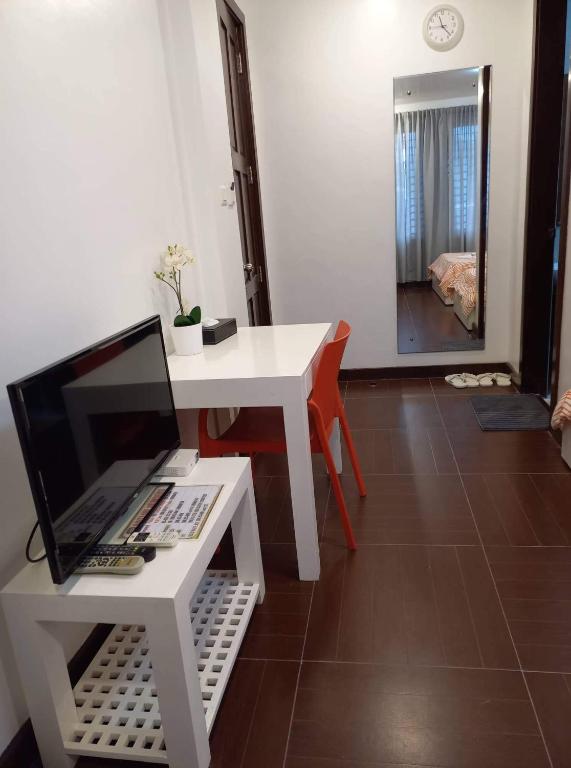 TV a/nebo společenská místnost v ubytování GLC SUITES