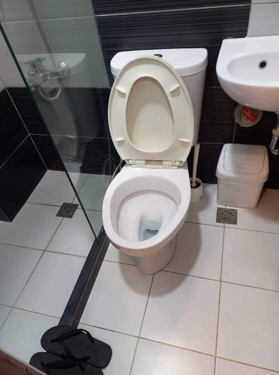 Koupelna v ubytování GLC SUITES