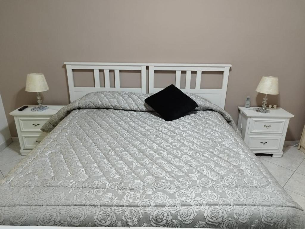 Postel nebo postele na pokoji v ubytování B&B Salita Metello