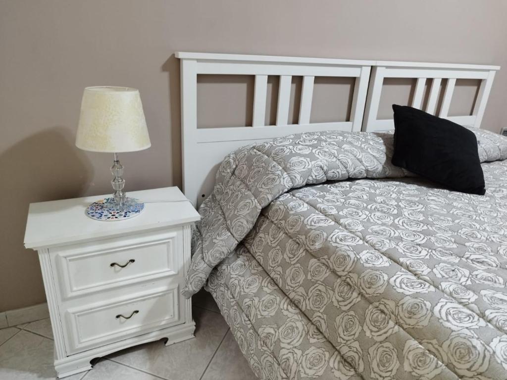 Postel nebo postele na pokoji v ubytování B&B Salita Metello