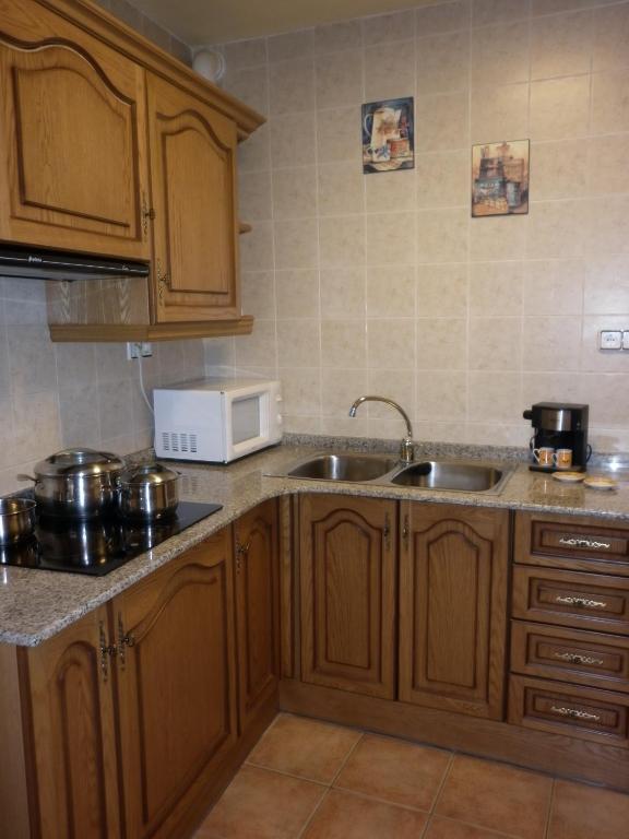 Kuchyň nebo kuchyňský kout v ubytování Casa Valentí