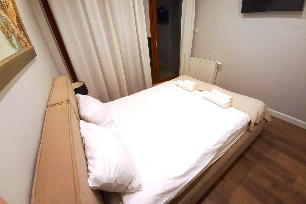 Posteľ alebo postele v izbe v ubytovaní erApartments Oxygen Residence