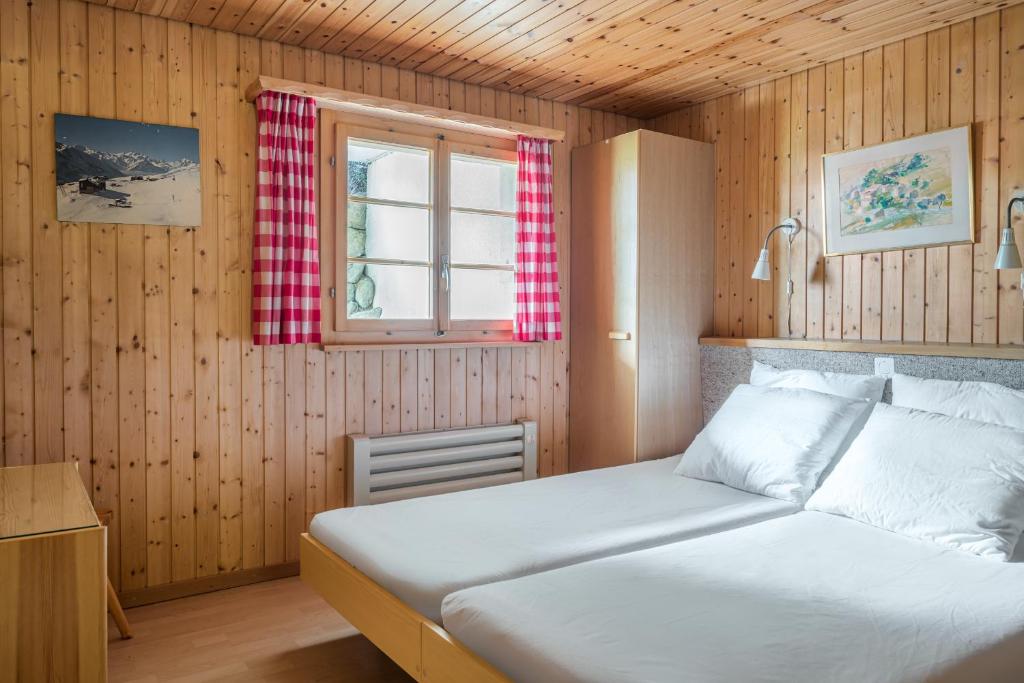 Postel nebo postele na pokoji v ubytování Wasserhügeli