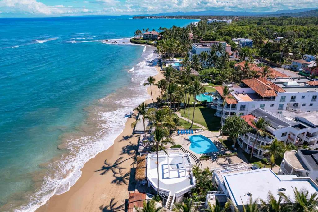 an aerial view of the beach and the ocean at Todo Bien Quality Studio Beachfront Kite Beach in Cabarete