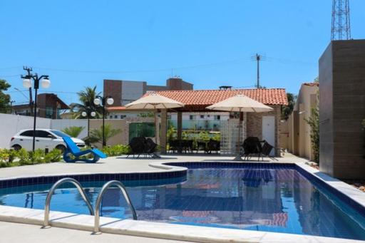 Πισίνα στο ή κοντά στο Residencial Makambira, Aconchegante e completo.