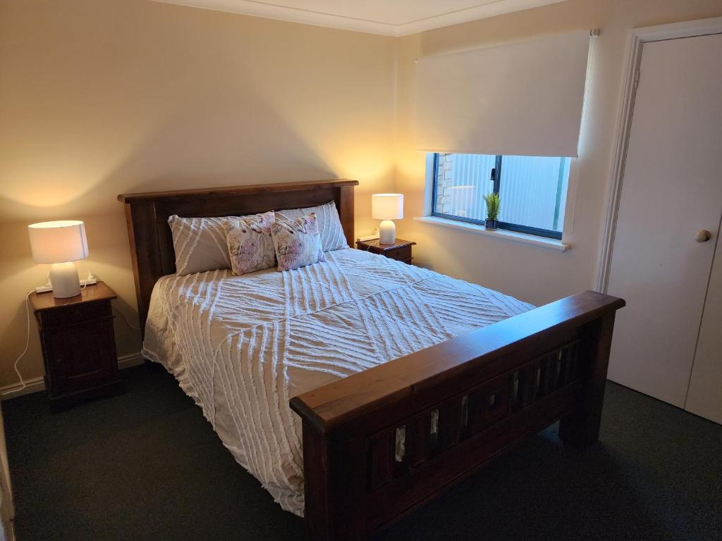 Ένα ή περισσότερα κρεβάτια σε δωμάτιο στο Comfortable Villa across the road from the Historic Recreation Hotel