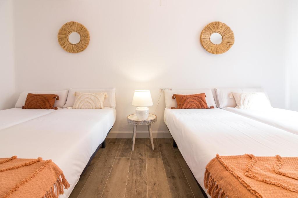 Posteľ alebo postele v izbe v ubytovaní Malaga Center Flat Holidays City Center