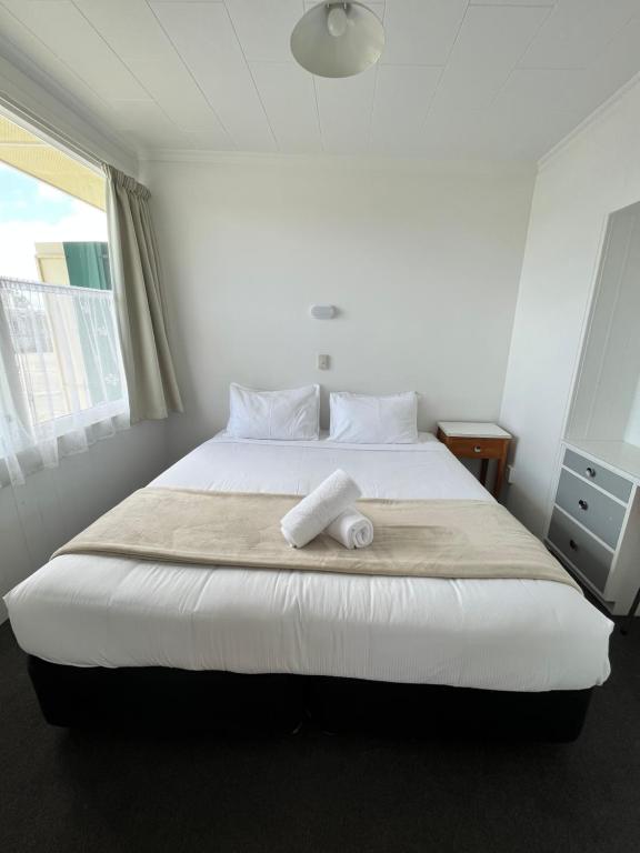 Postel nebo postele na pokoji v ubytování Bings Motel