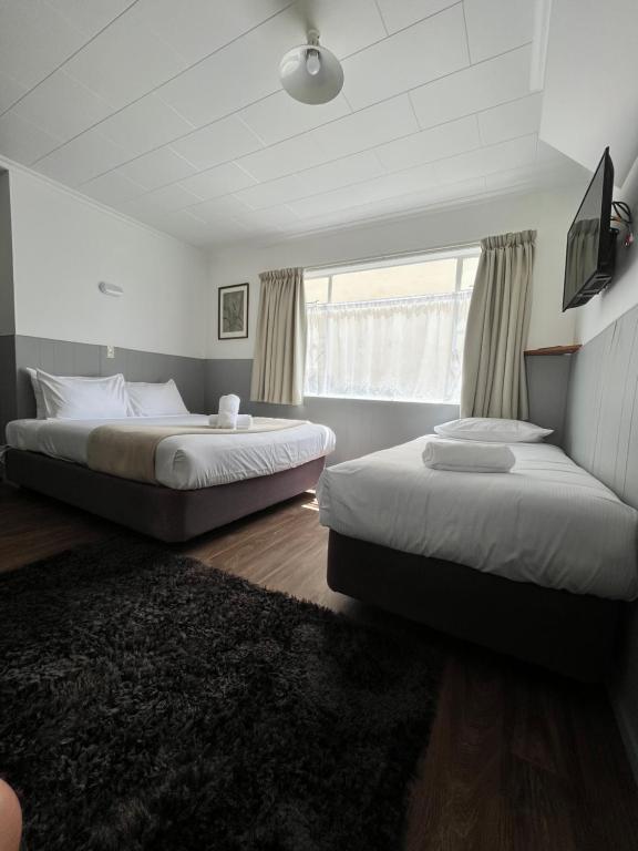 Postel nebo postele na pokoji v ubytování Bings Motel