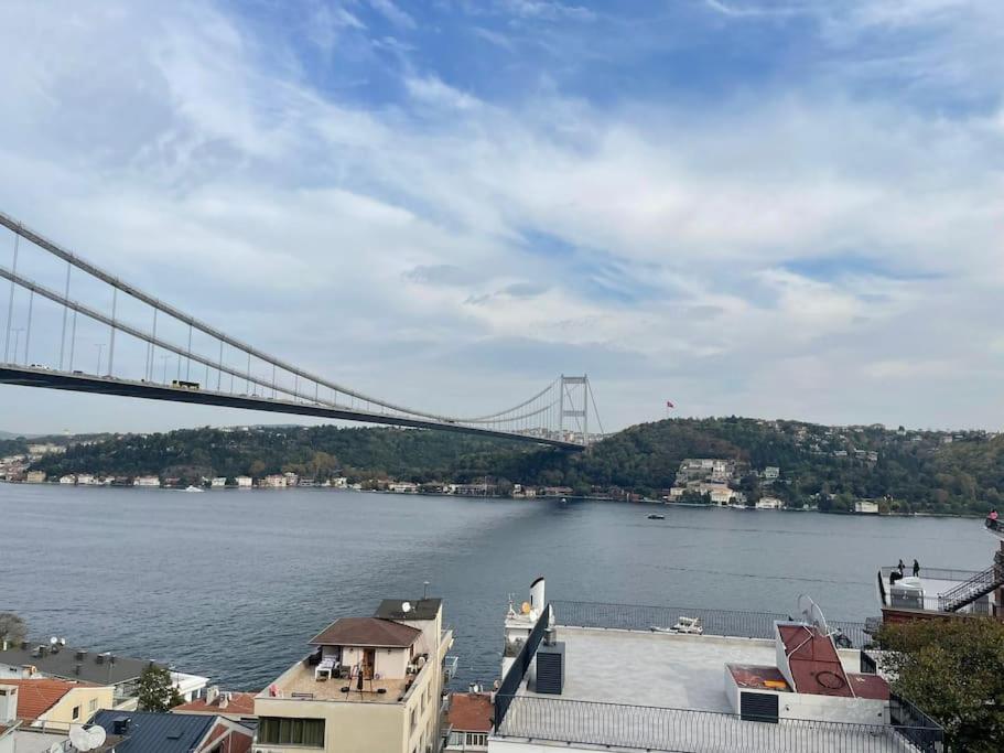 a bridge over a large body of water with buildings at Unique Bosphorus view of historical Istanbul. in Istanbul