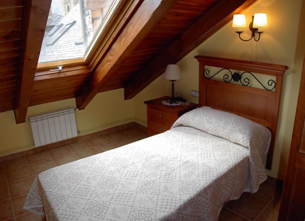 Postel nebo postele na pokoji v ubytování Casa Valentí