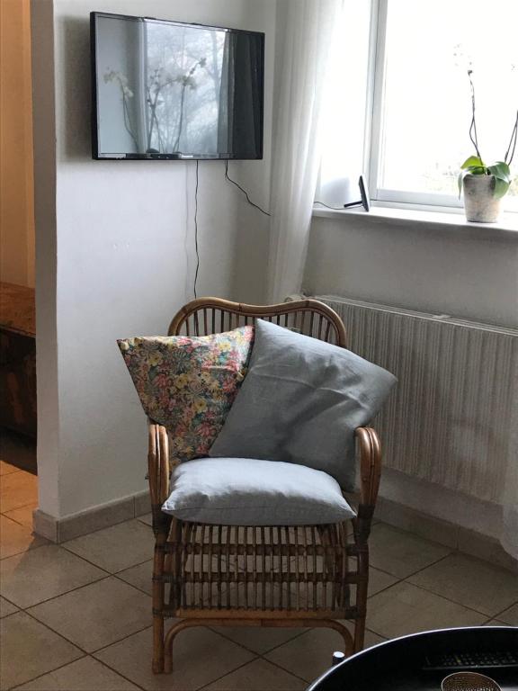 TV a/nebo společenská místnost v ubytování Tiklo Bed and Breakfast