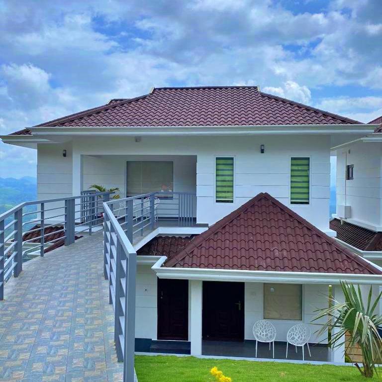Balkón nebo terasa v ubytování The Windy Mist Resort Munnar