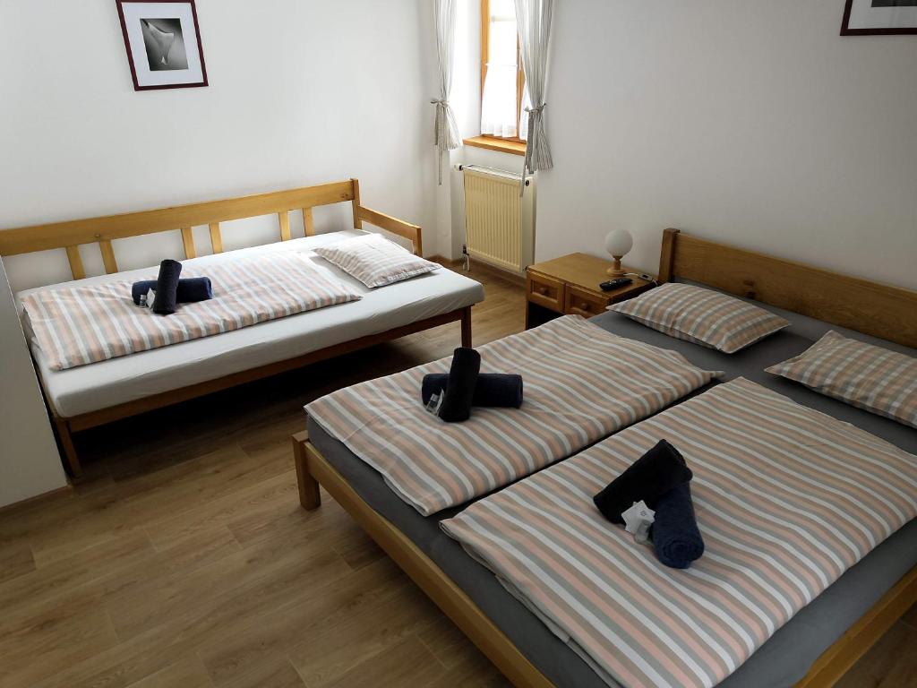 Postel nebo postele na pokoji v ubytování Hotel Gabriela